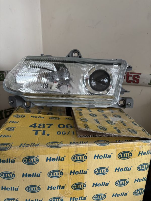 Headlight left - 60587938 HELLA 1AL 006 970-09 - Alfa Romeo 145 146