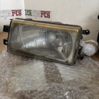 Headlight - Carello 03290748 - Alfa Romeo 75 **used part**