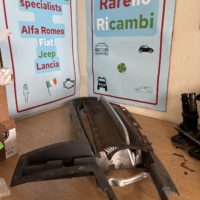Lower bumper trim with mesh - 60680904 - Alfa Romeo 166 facelift **used part, some marks**